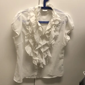 Saint Tropez blus - Blus i fint skick. Storlek: M-L