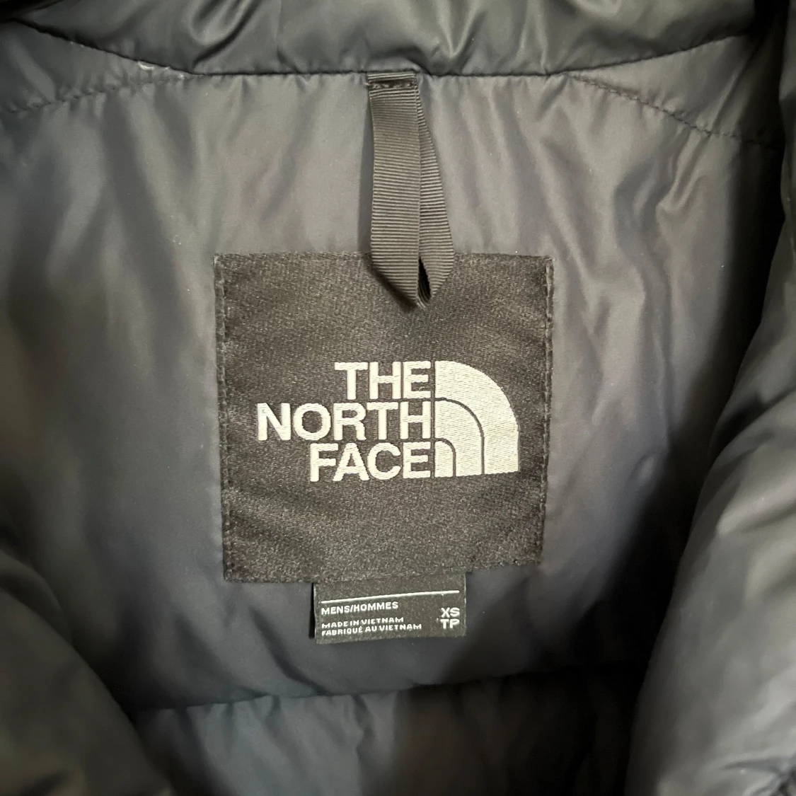 Svart dunjacka från The North Face - 93