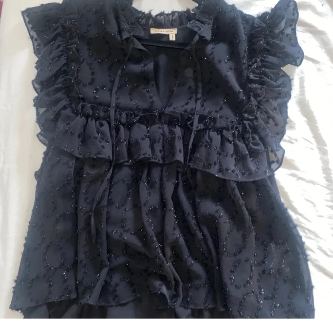 Glittrig blus