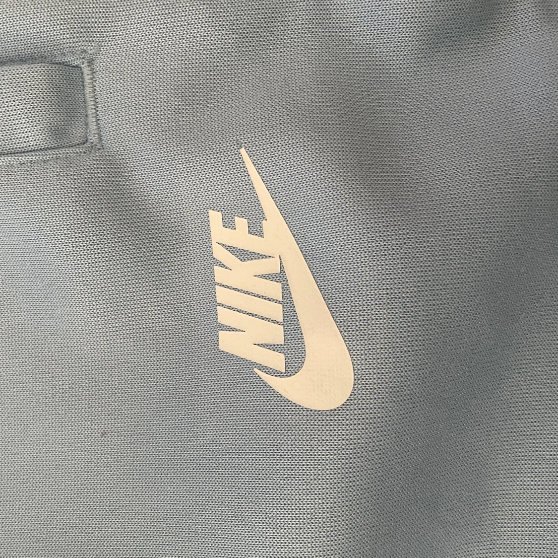 Ljusblåa Nike byxor - 90