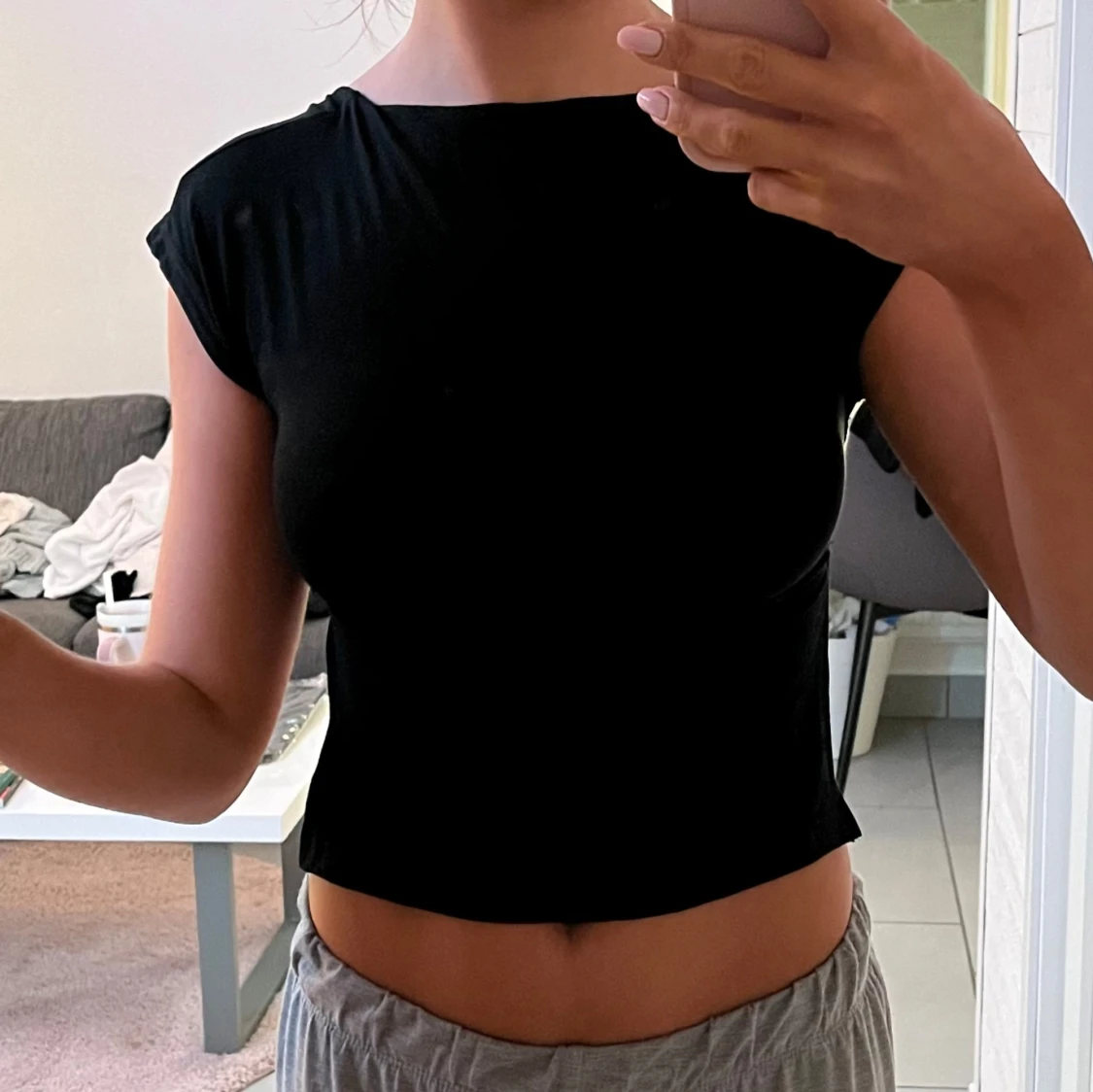 Svart topp med öppen rygg - 91