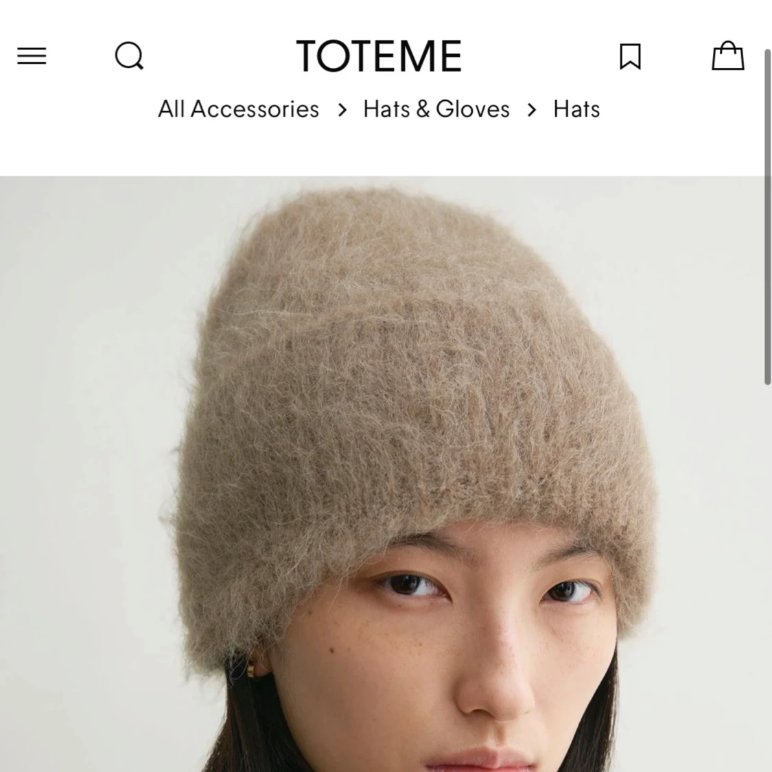 Beige stickad mössa från Toteme