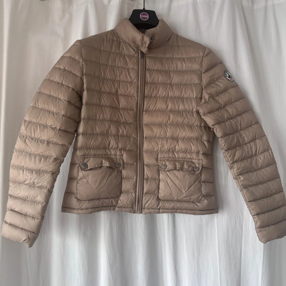 Beige dunjacka från J.O.T.T