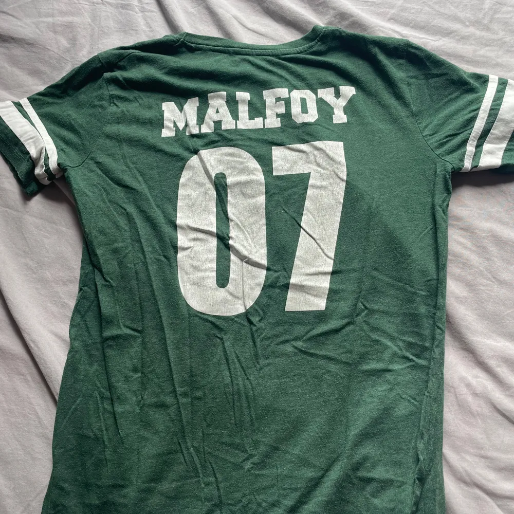 En Draco malfoy T-shirt. T-shirts.