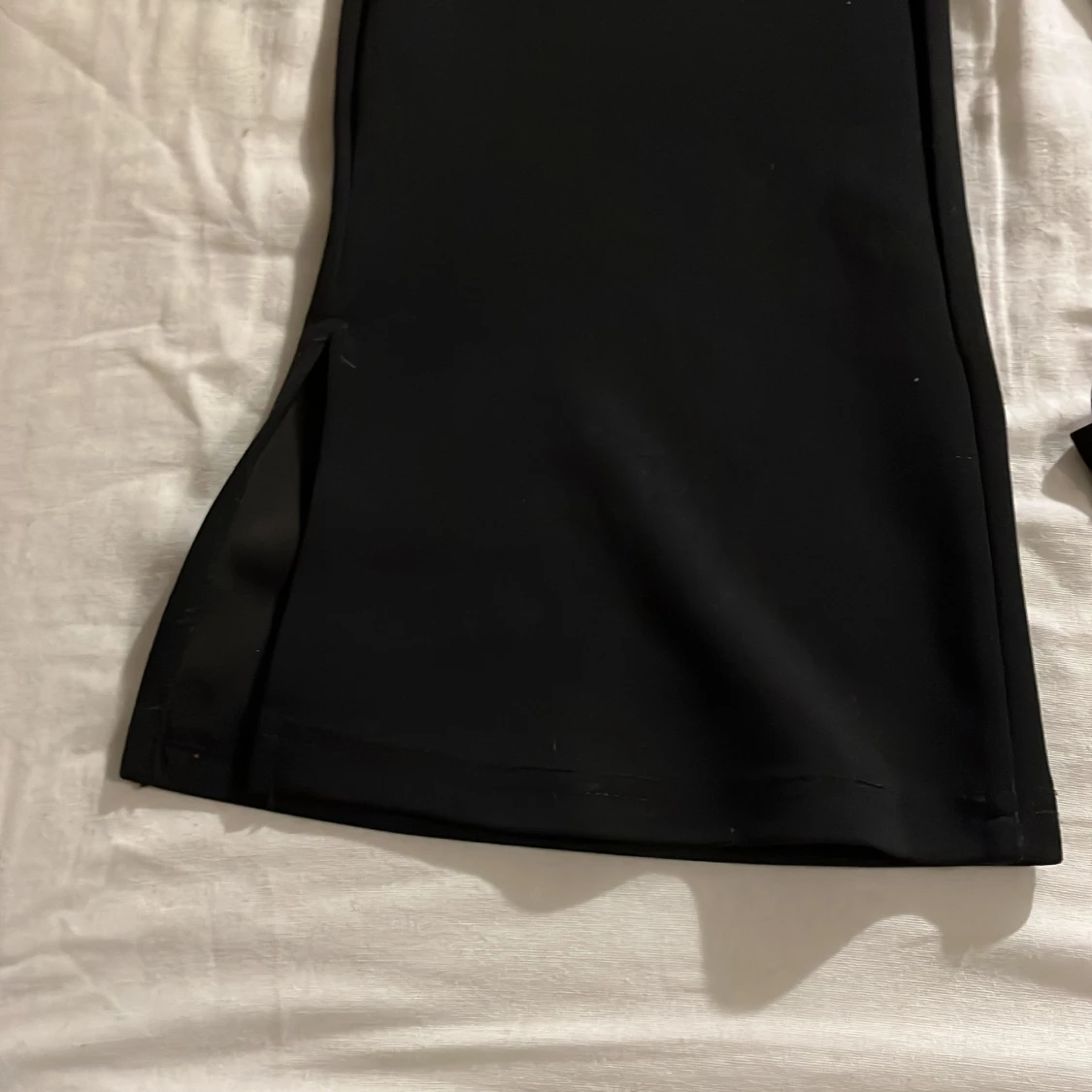 Svarta byxor med slits - 1