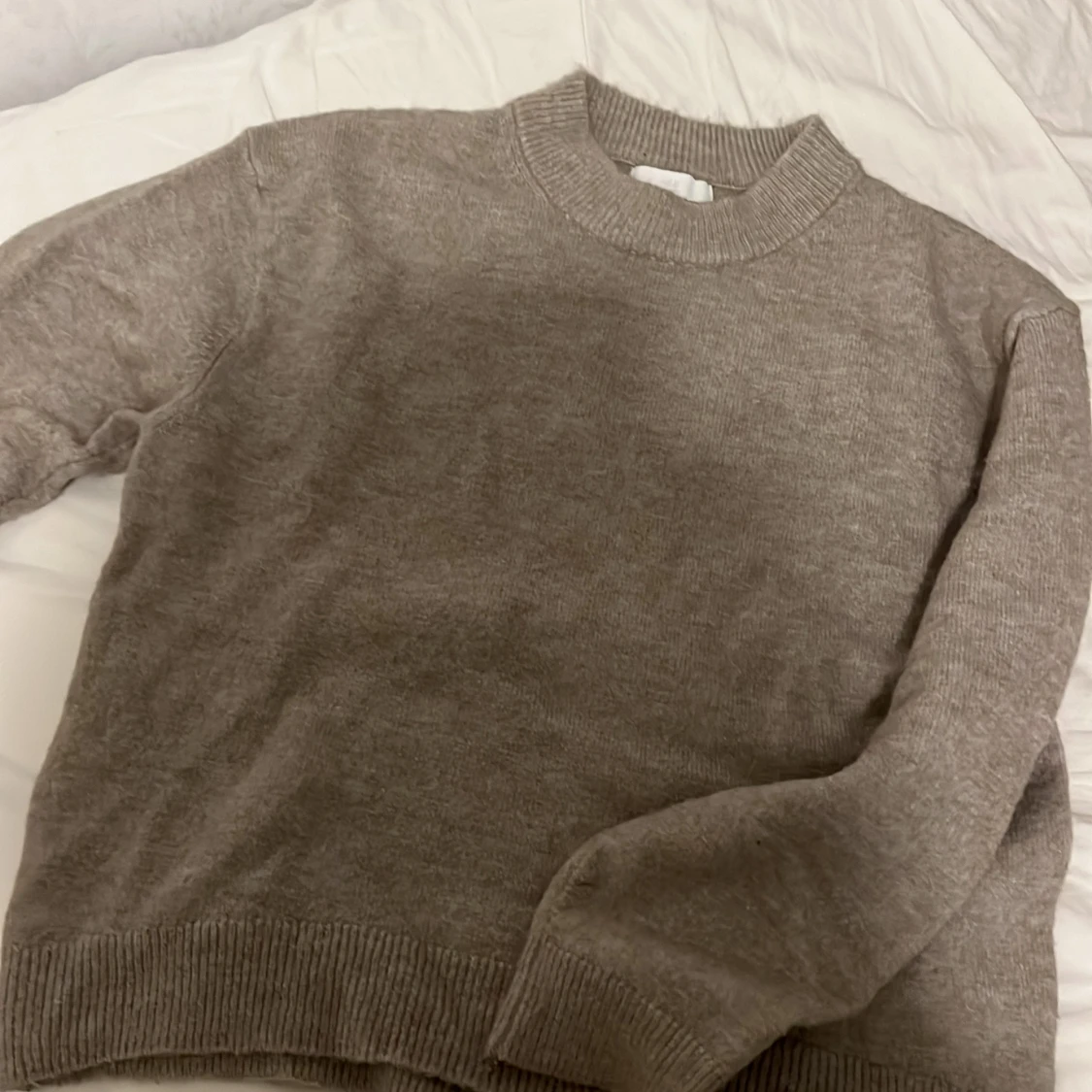 Beige stickad tröja