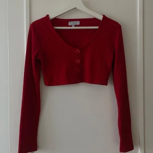 Rött set  - Ett rött set med tröja och byxa