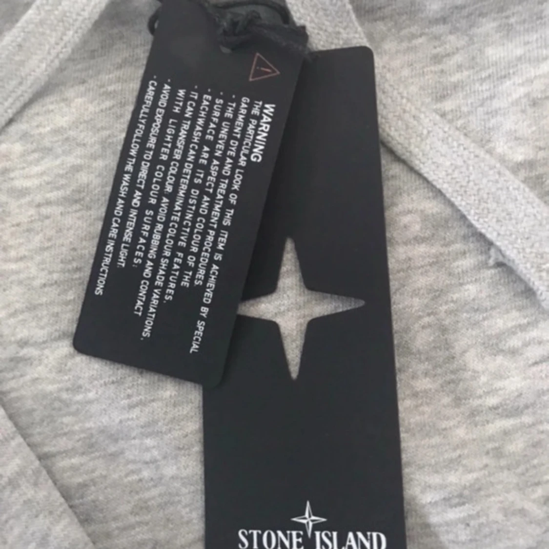 Grå hoodie från Stone Island - 2
