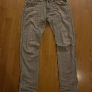 Replay anbass  - Snygga gråa replay jeans, storlek 30