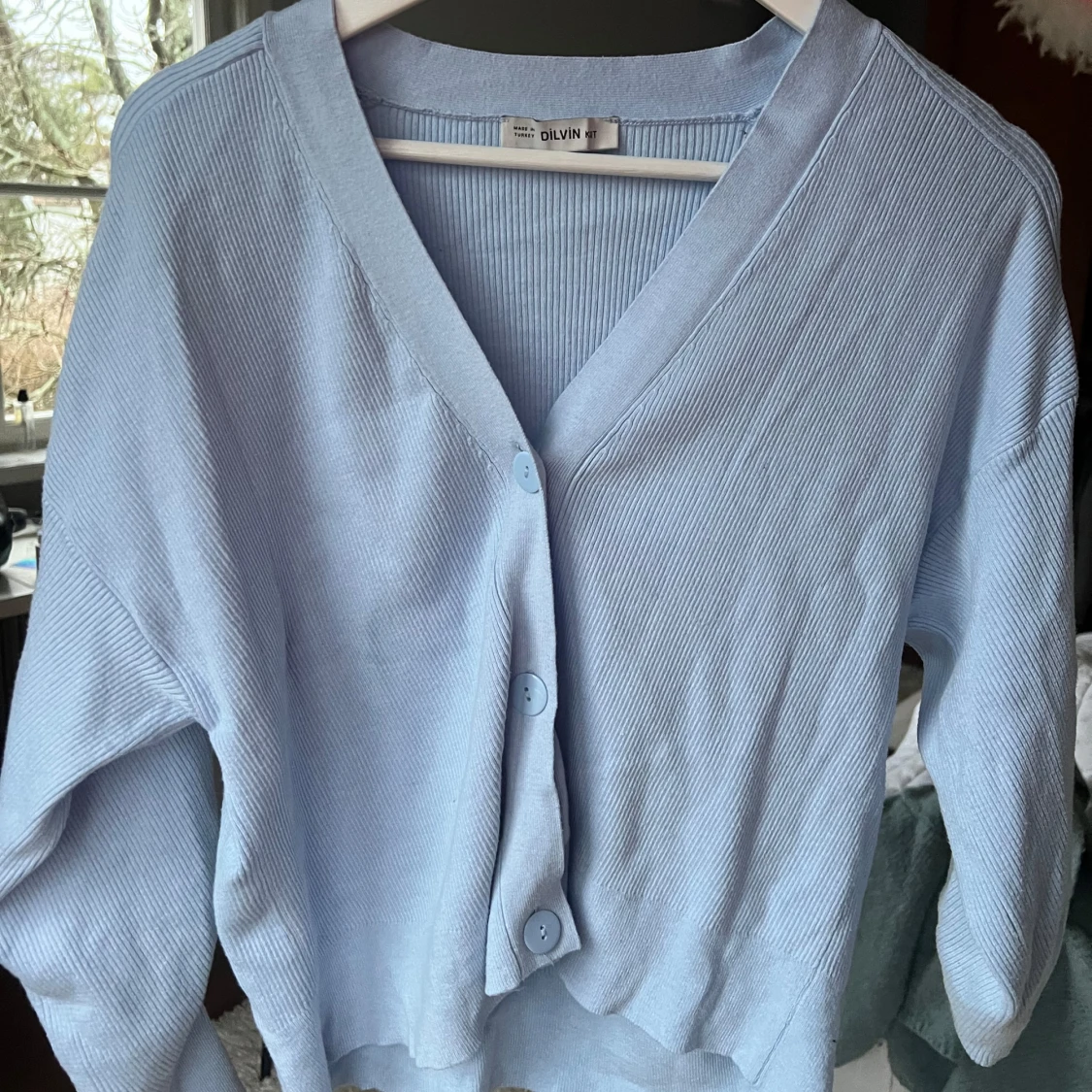 Ljusblå ribbad kofta