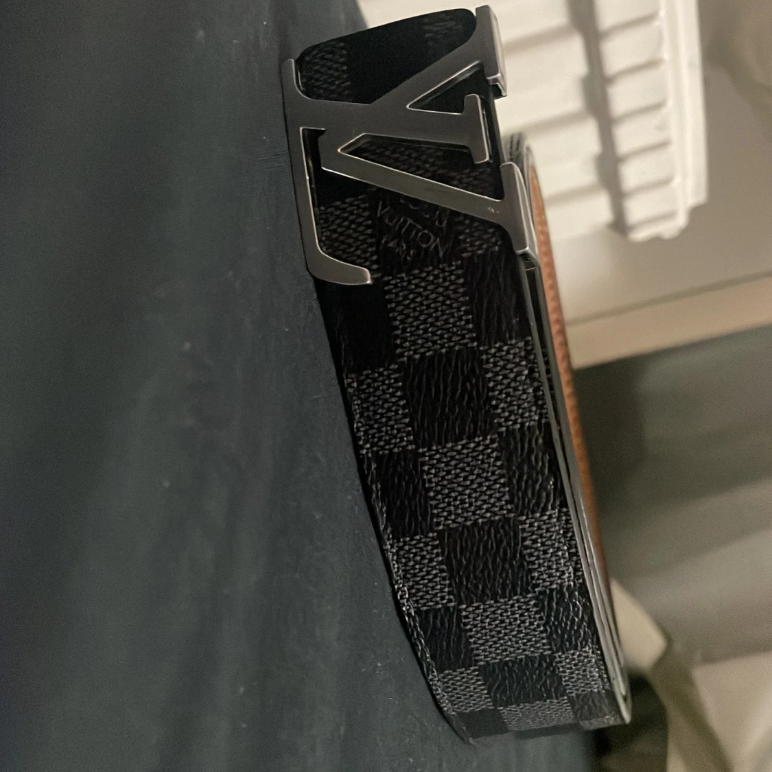 Svart rutigt bälte från Louis Vuitton