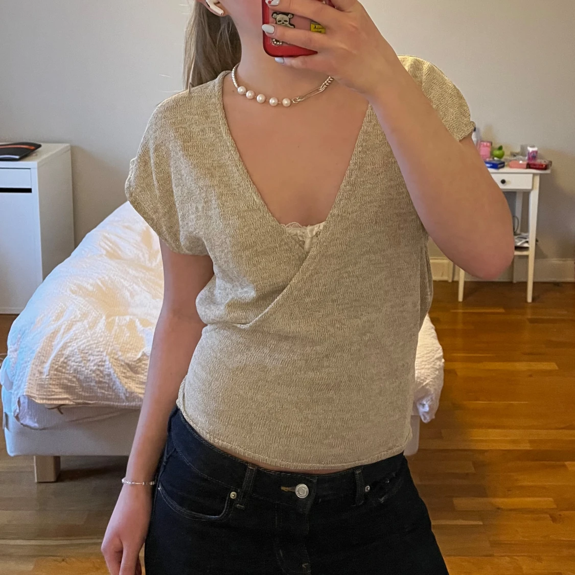 Glittrig stickad topp