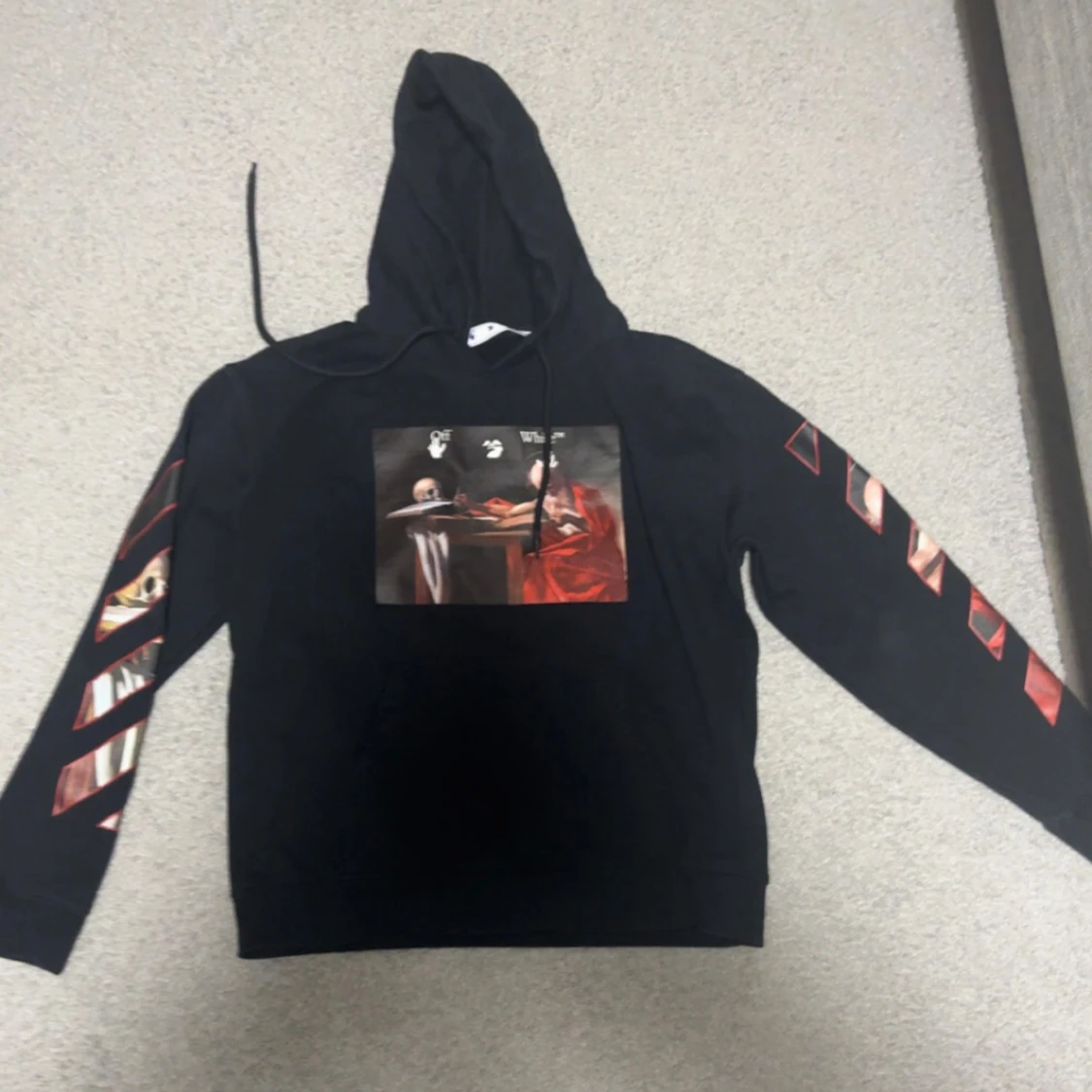 Svart hoodie från Off-White med Caravaggio-tryck