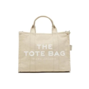 Marc Jacobs tote bag - Säljer/ byter min jätte fina Marc Jacobs tote bag. Originalpris ca 3000, kan också tänka mig byte. Kommer med svart axelrem så man kan ha väskan off shoulder. Säljer då den inte används längre.