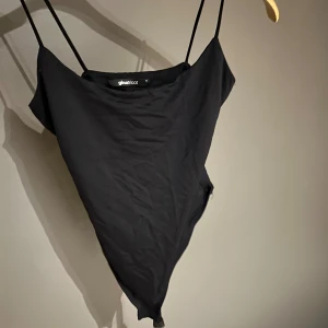 Body från gina - En jätte fin body från gina som aldrig kommit till användning 
