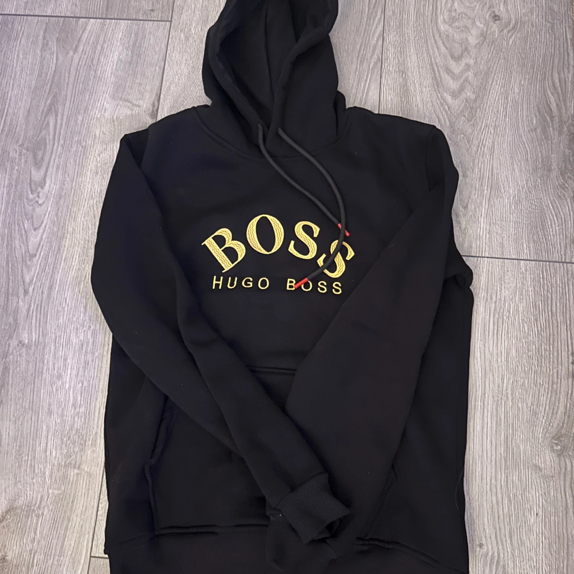 Svart hoodie från Hugo Boss - 91