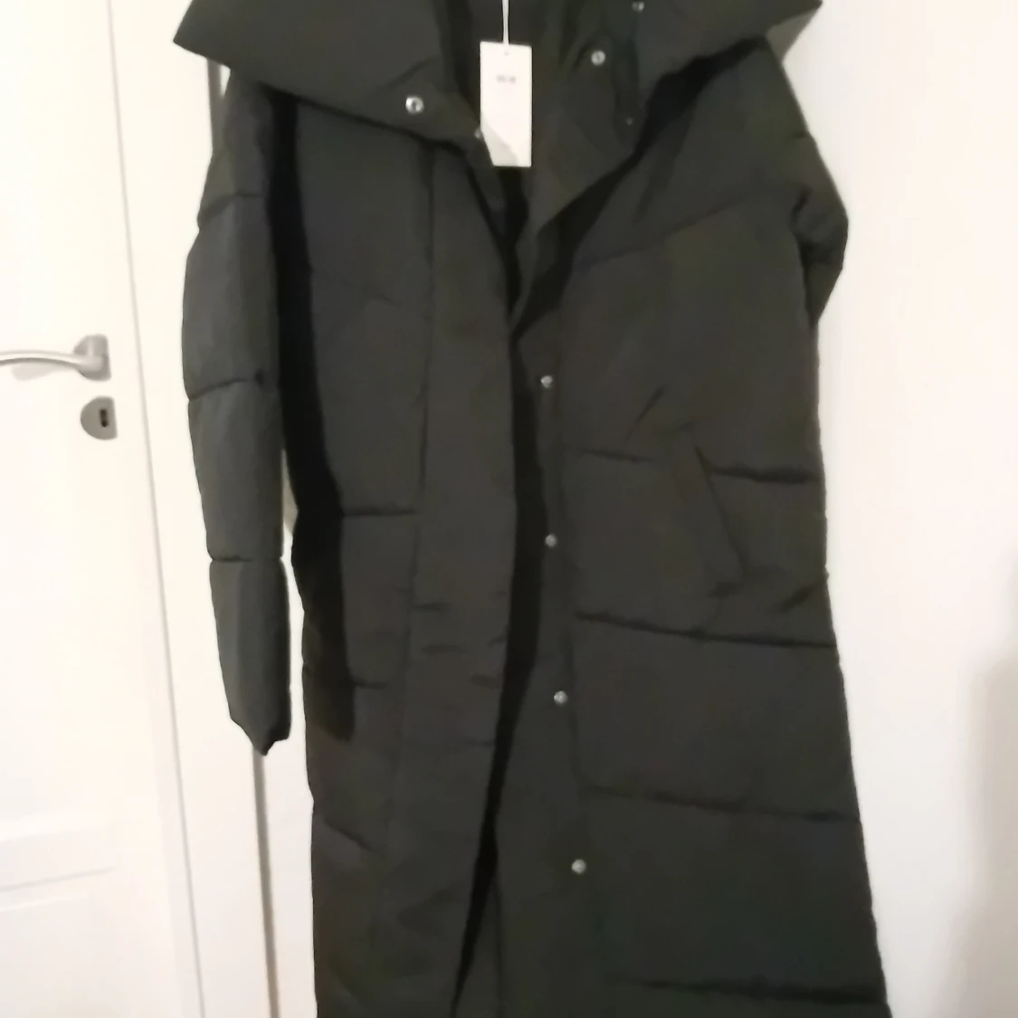 Svart vadderad kappa från Vila - 93