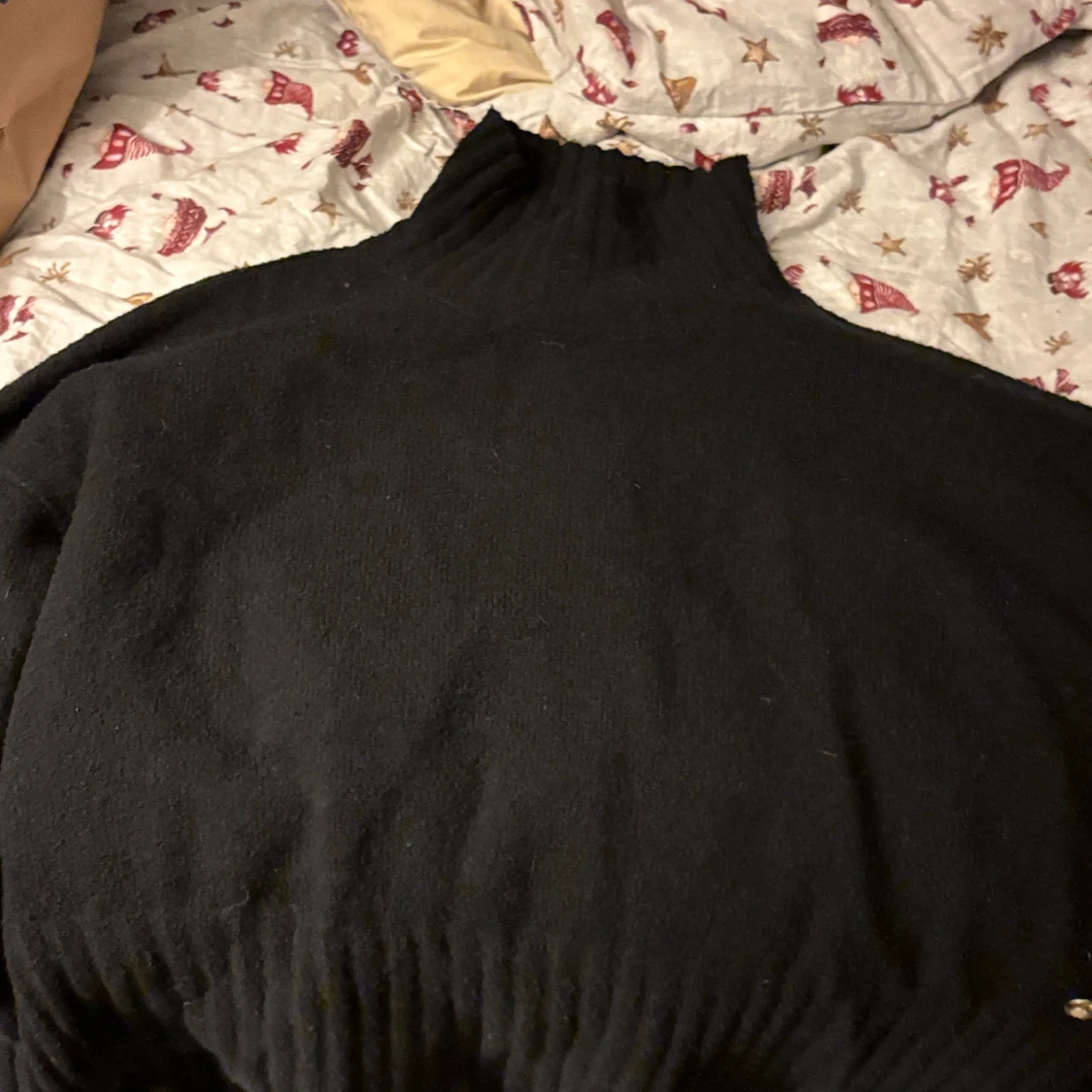 Svart polotröja från Pernilla Wahlgren