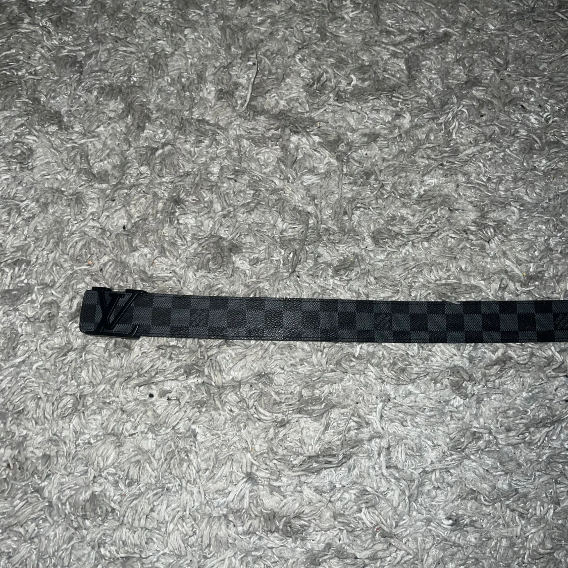 Svart rutigt bälte - 91