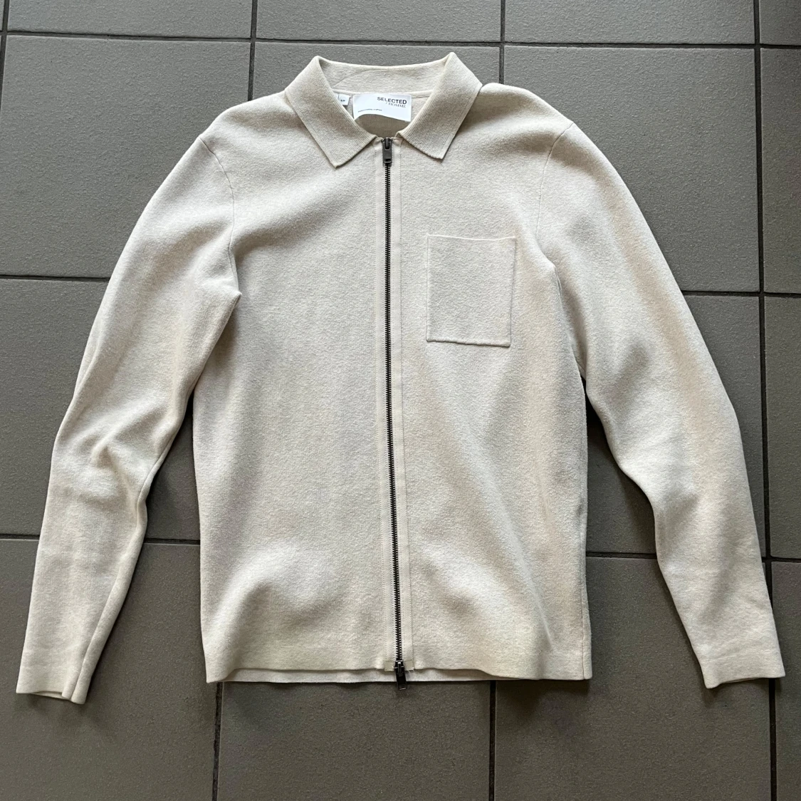 Beige stickad tröja