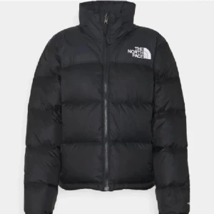 Jacka  - En oanvänd jacka 