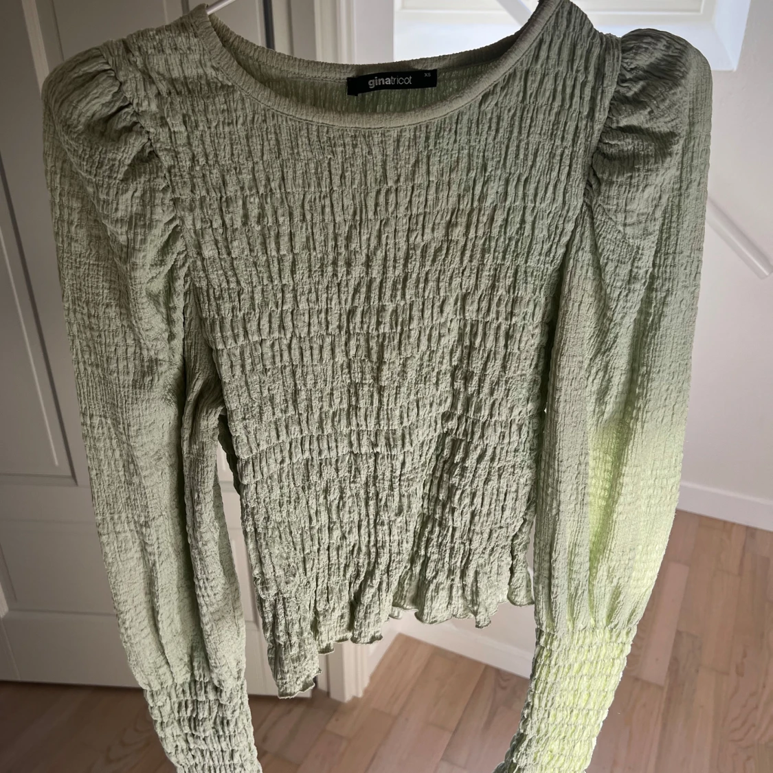 Ljusgrön tröja