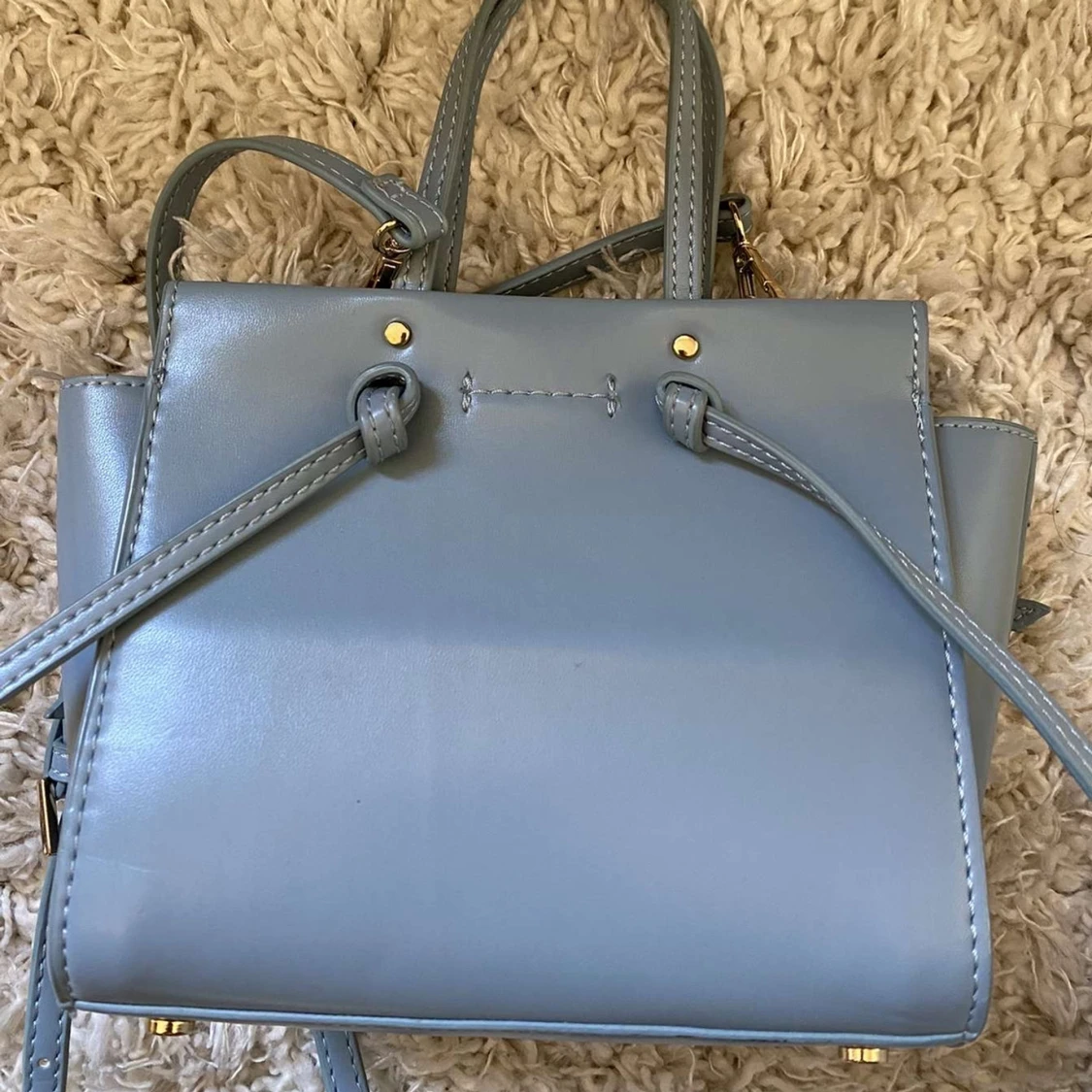 Ljusblå hansväska - 1