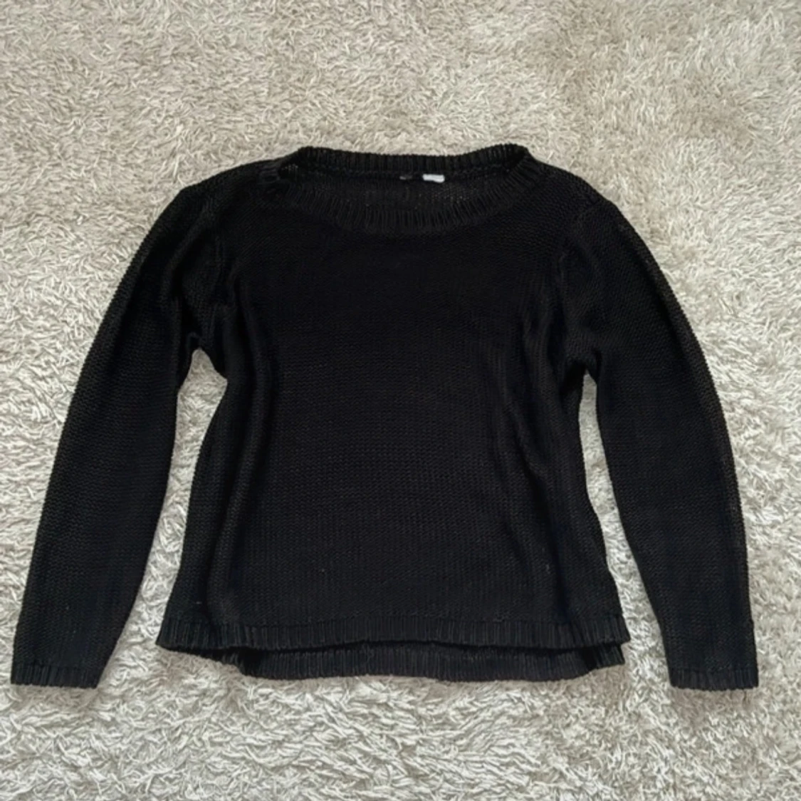 Svart stickad tröja