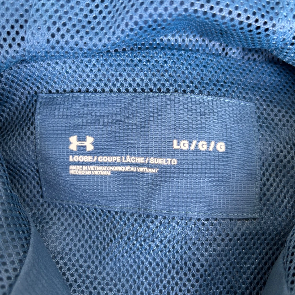 Blå vindjacka med huva från Under Armour - 3