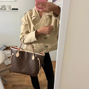 Brun väska  - Vet inte om den är äkta 