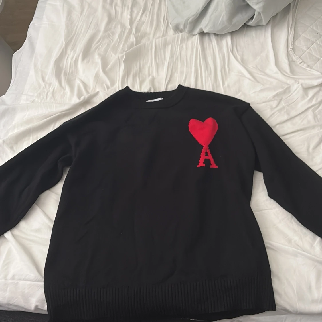 Svart stickad tröja från Ami Paris