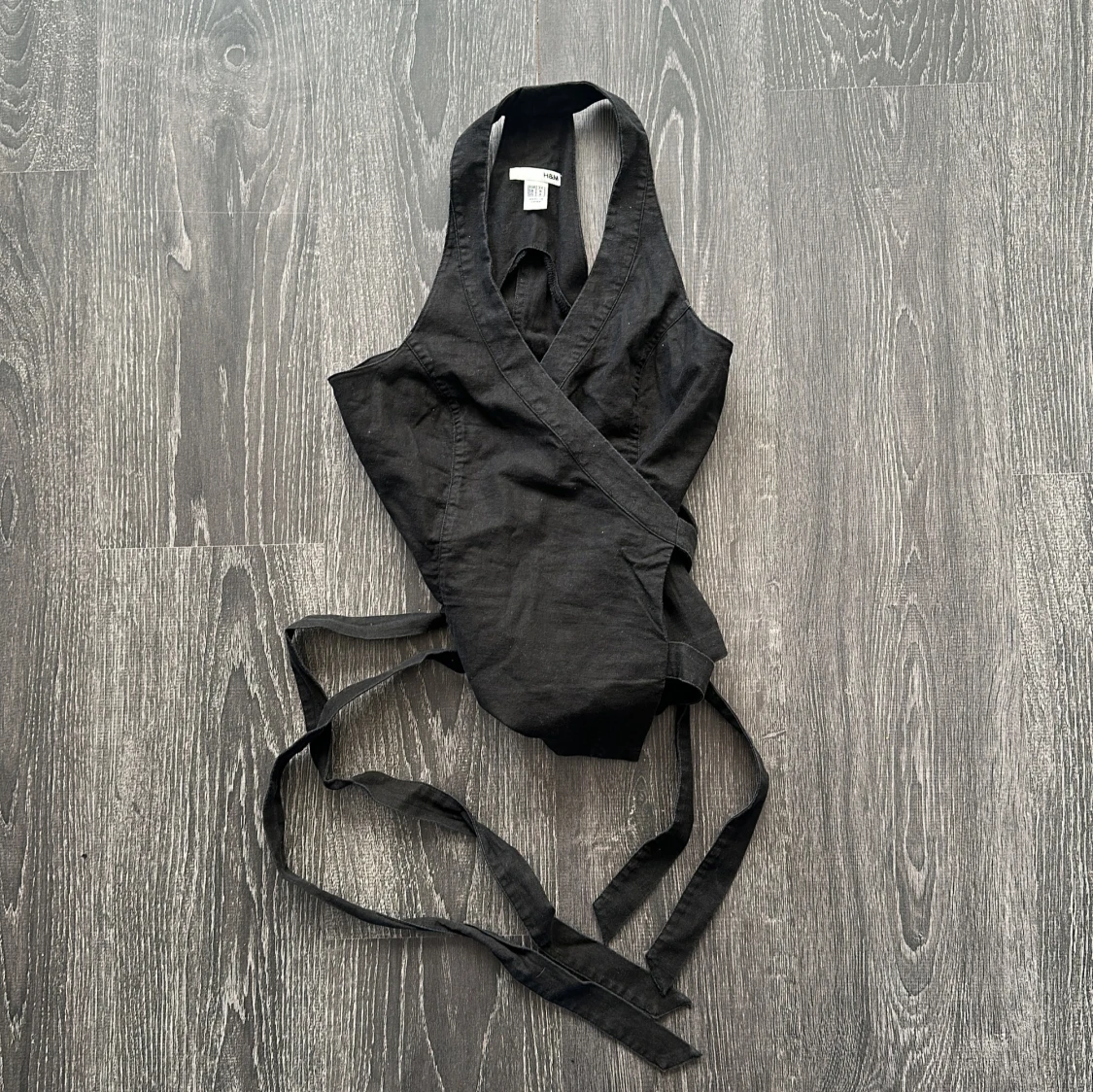 Svart omlott korsettopp med knytband