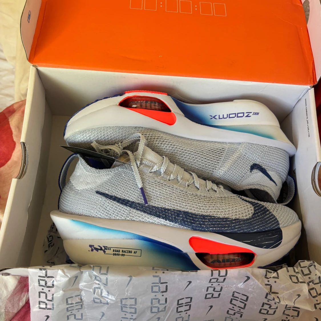 Nike ZoomX sneakers i silver och blå