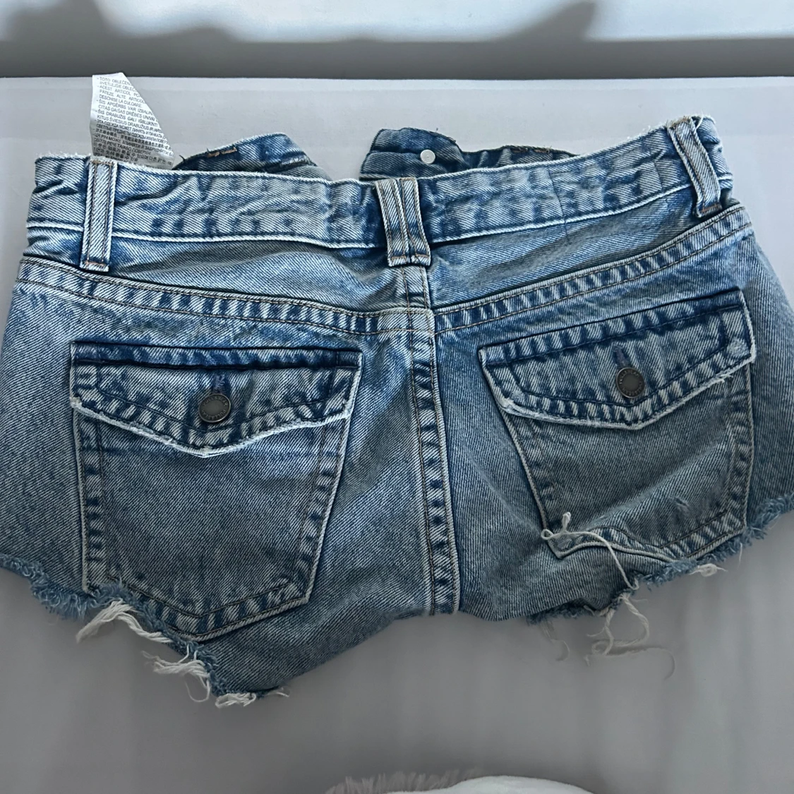 Blå jeansshorts med fransar - 1