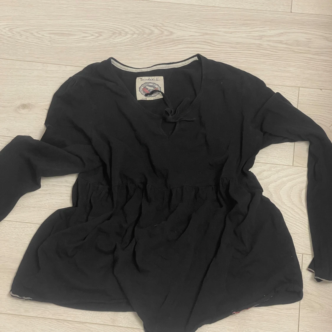 Svart långärmad topp med knyt - 1