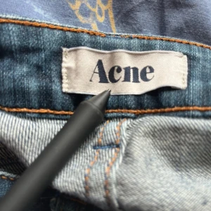  Acne Studios slim jeans - kan mötas i vasastan vid snabbaffär 