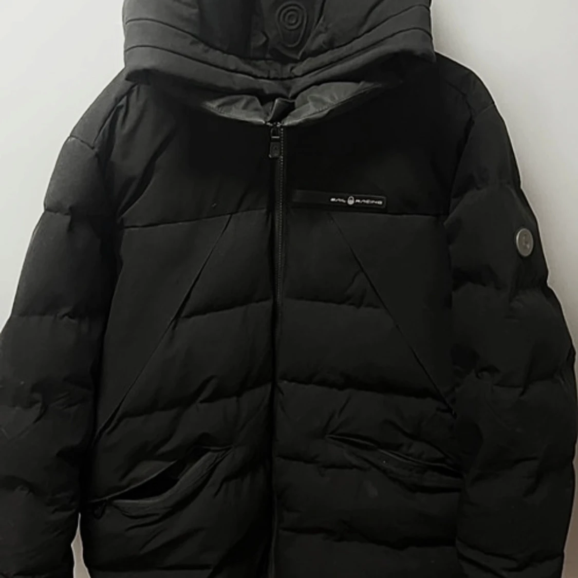 Svart pufferjacka från Sail Racing