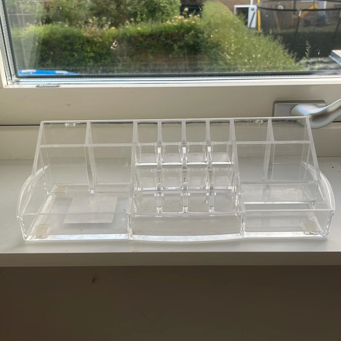 Transparent sminkförvaring i akryl