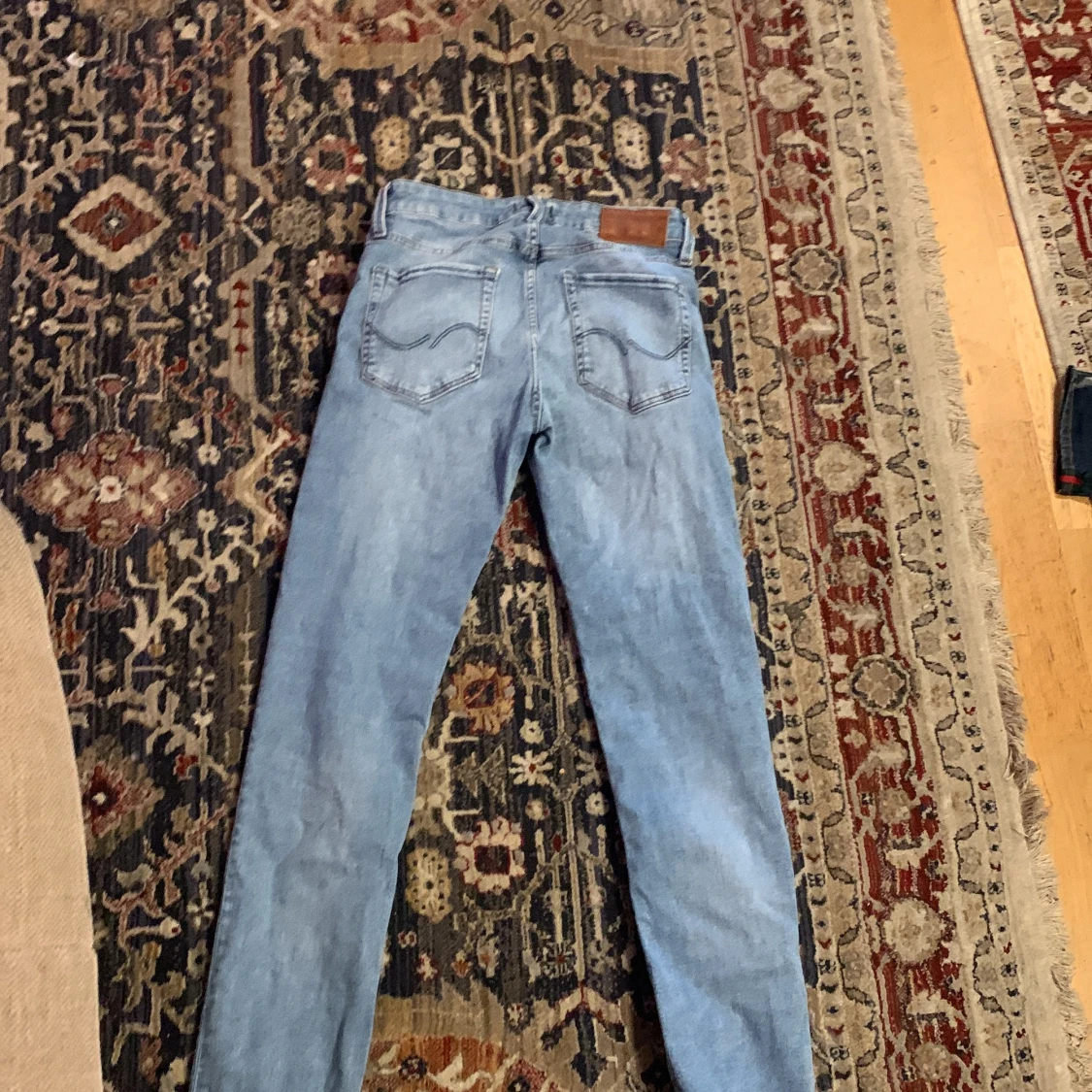 Ljusblå jeansbyxor - 1