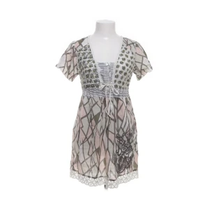 Mönstrad blus från Flash - Kortklänning / blus från Flash i mycket bra skick.  