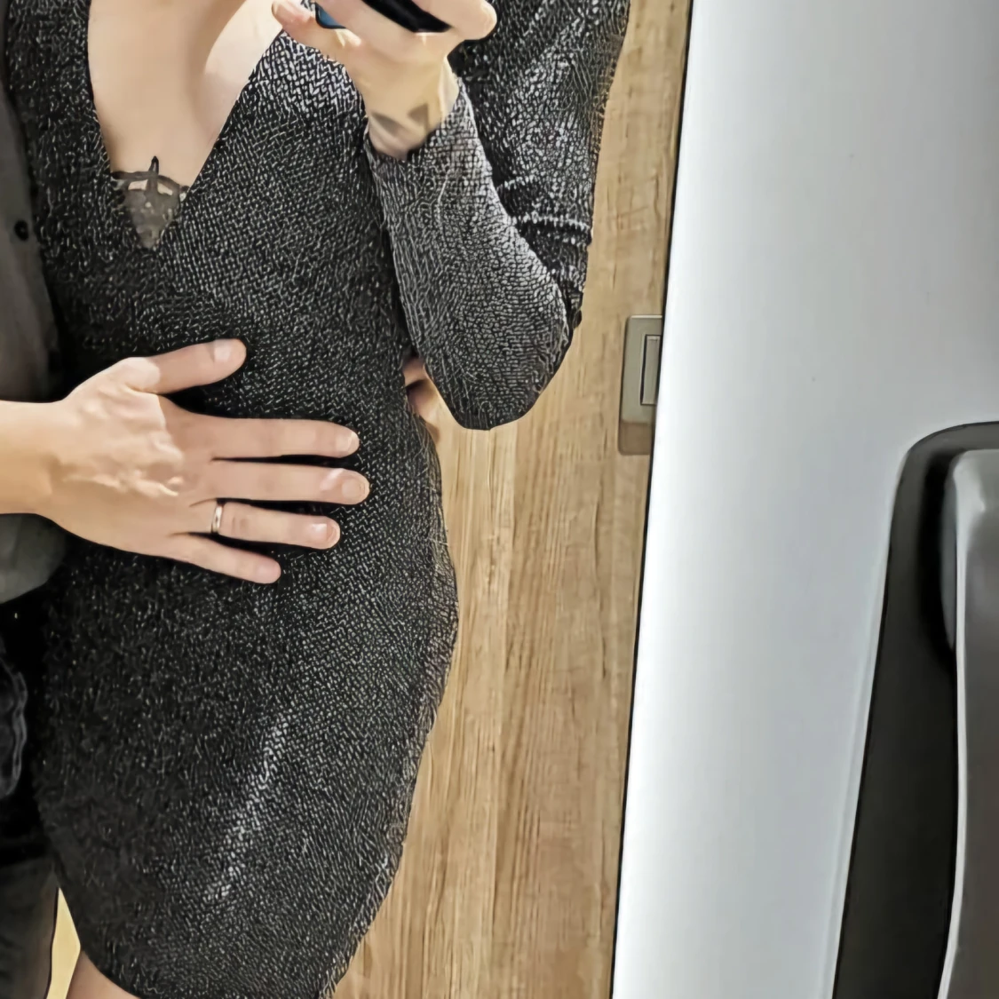 Svart glittrig klänning från Motel