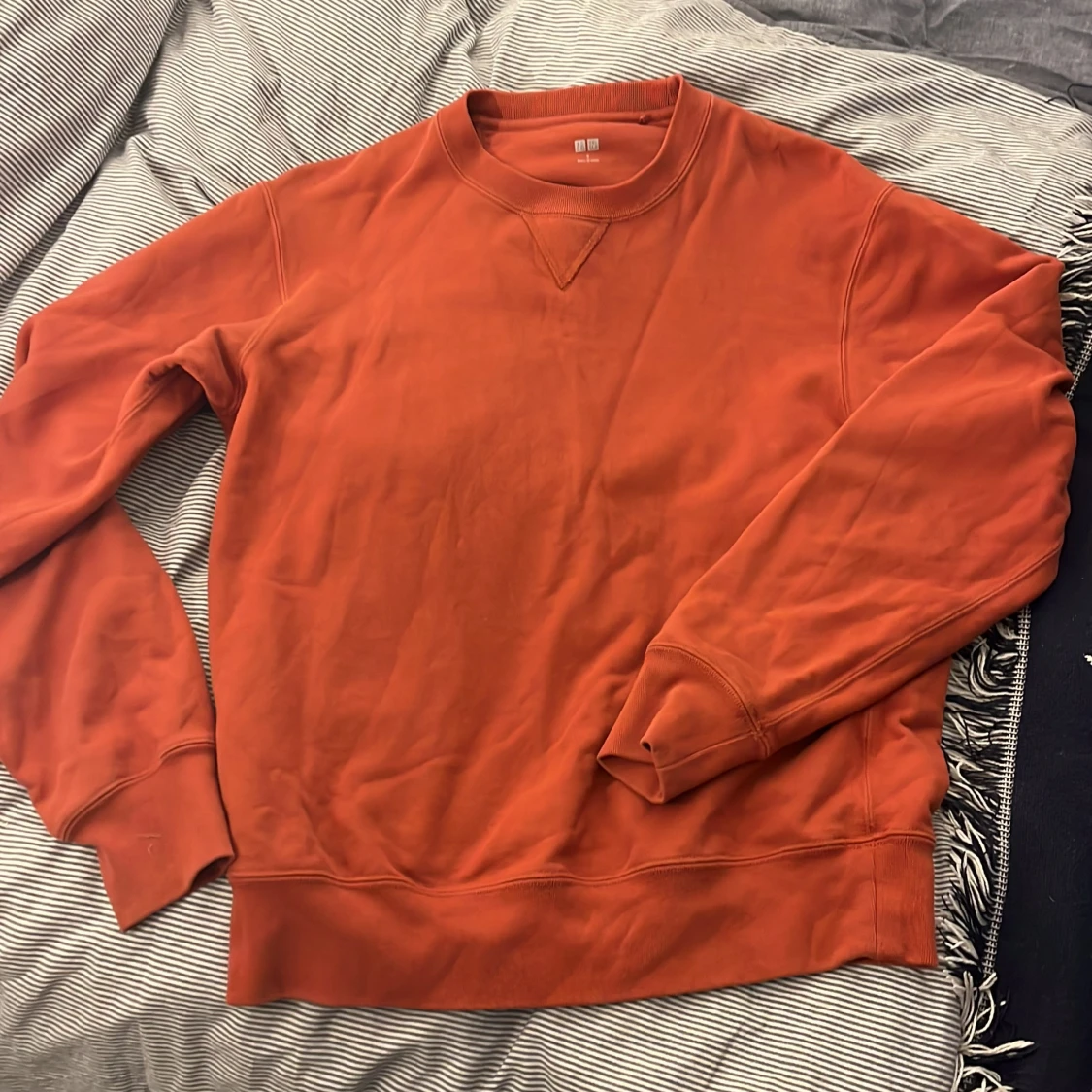 Orange uniqlo crewneck