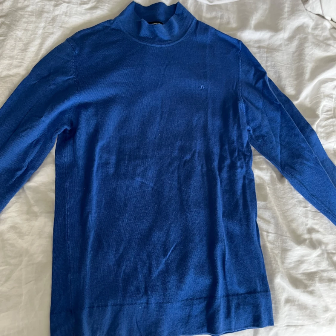 J.Lindeberg Blå merinoull polotröja. storlek S herr