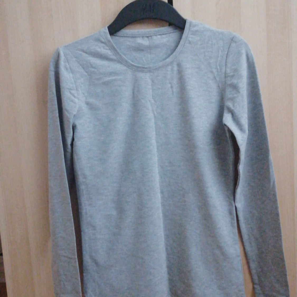 Grå långärmad tröja