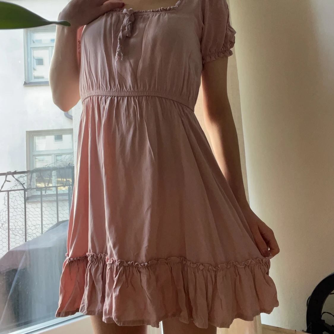 Rosa klänning med puffärmar