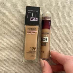 Foundation och concealer från Maybelline - Säljer en Maybelline Fit Me foundation i nyansen 125 Nude Beige med SPF 18 och en Maybelline Instant Age Rewind concealer i nyansen 02. Perfekt för en jämn och naturlig look. Concealern har ingen sån liten applikator men funkar annars utmärkt. Foundation är provad men för mörk för mig. 