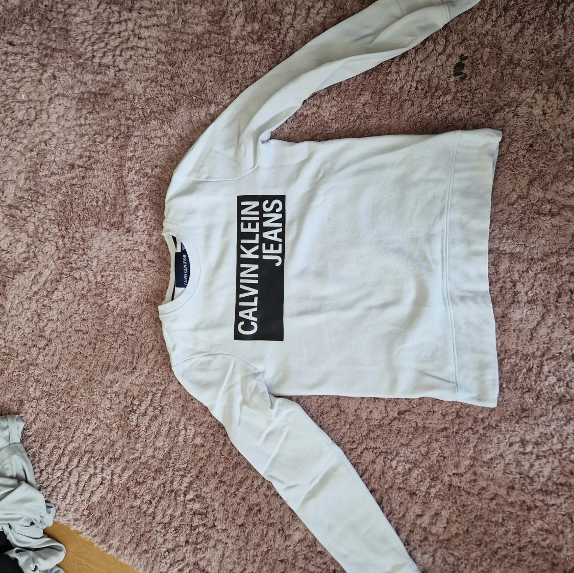 Vit sweatshirt från Calvin Klein Jeans