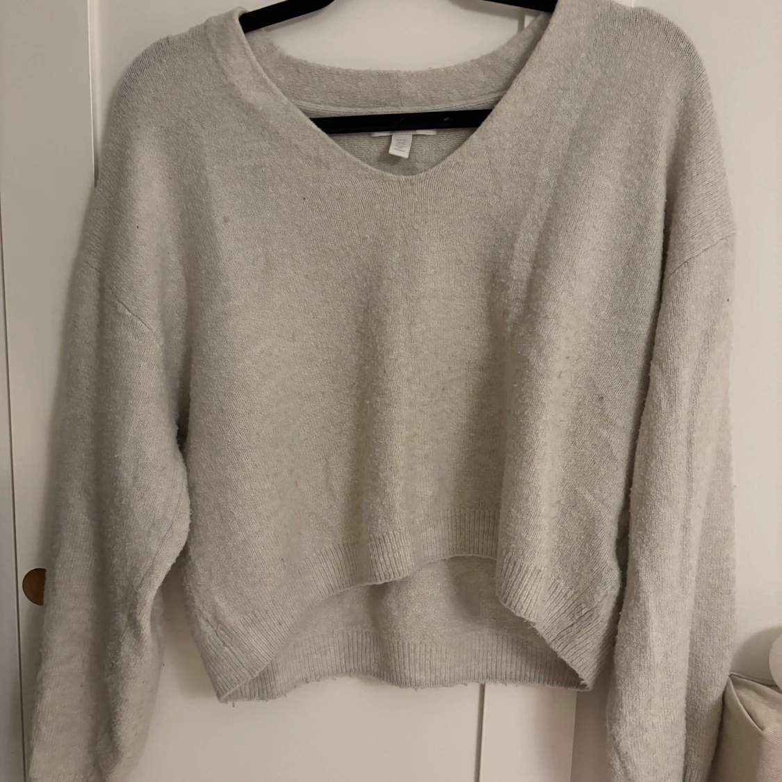 Beige stickad tröja