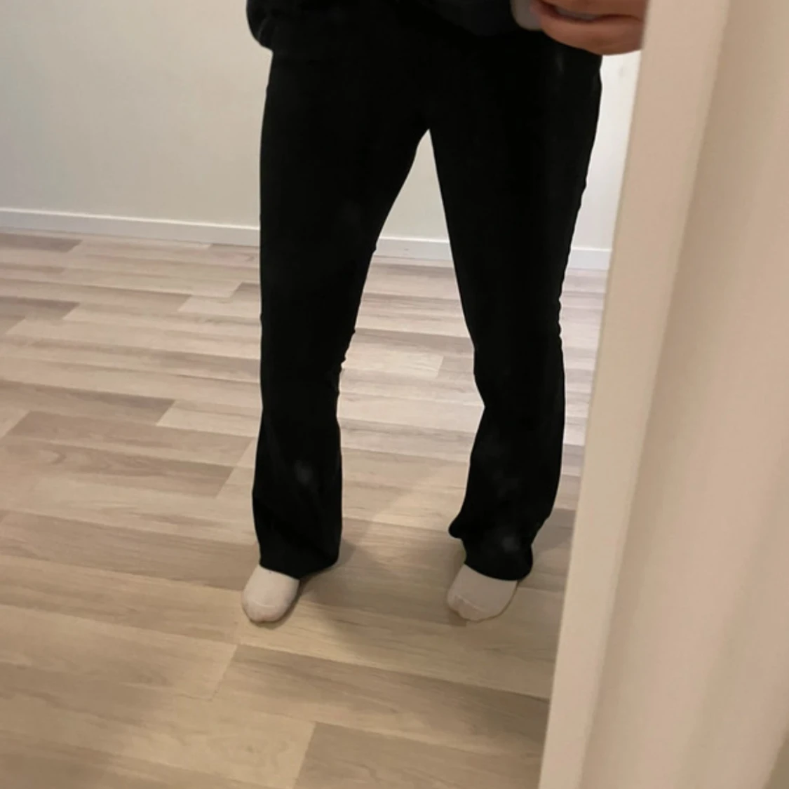 Svarta bootcut byxor