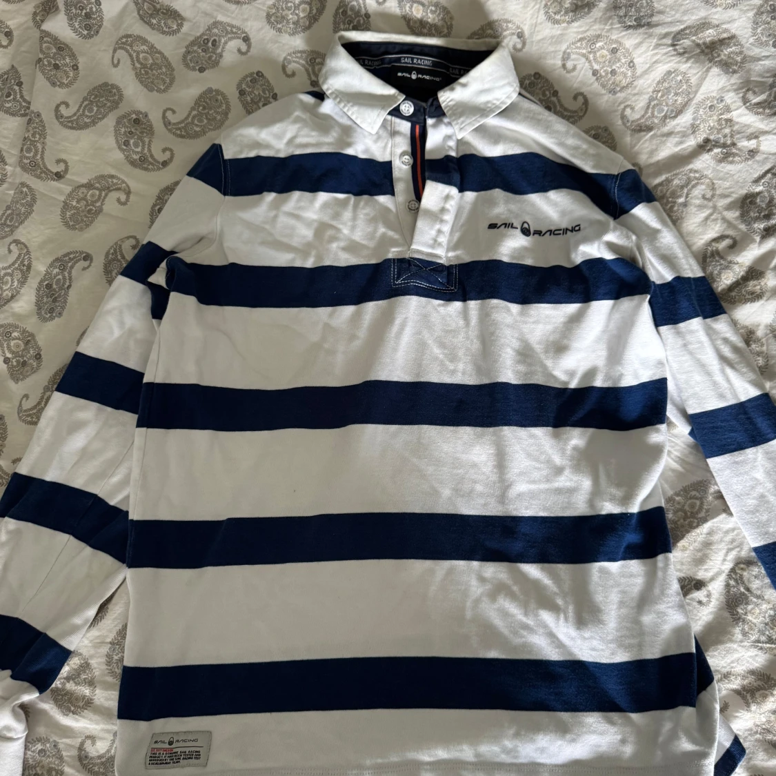 Randig pikétröja från Sail Racing